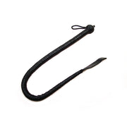 Handmade black leather devil tail whip with a wrist strap.