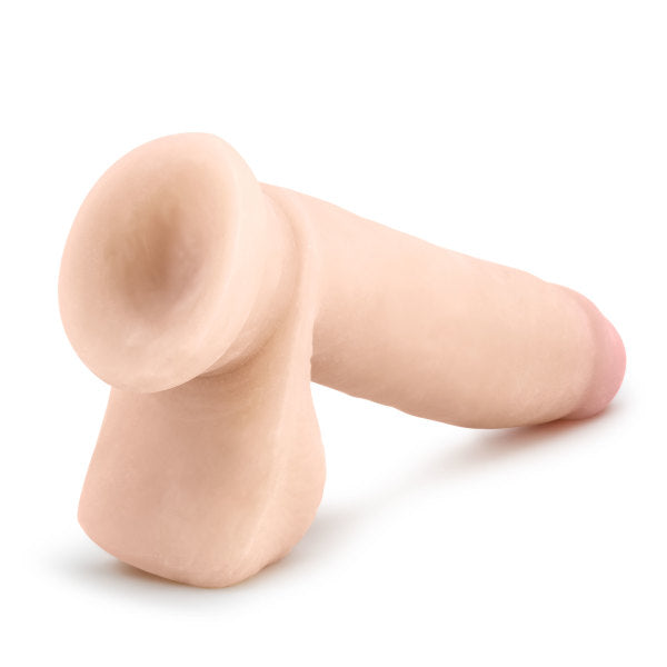 7-inch dual density suction cup dildo in blush color, angled view.