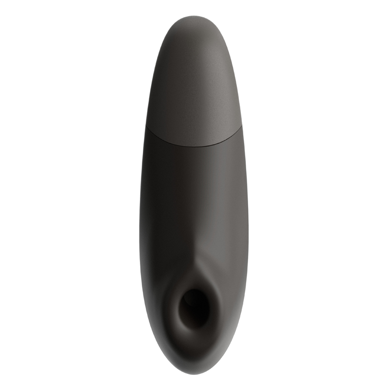 A dark gray clitoral stimulator with a rounded top and a textured opening at the bottom.