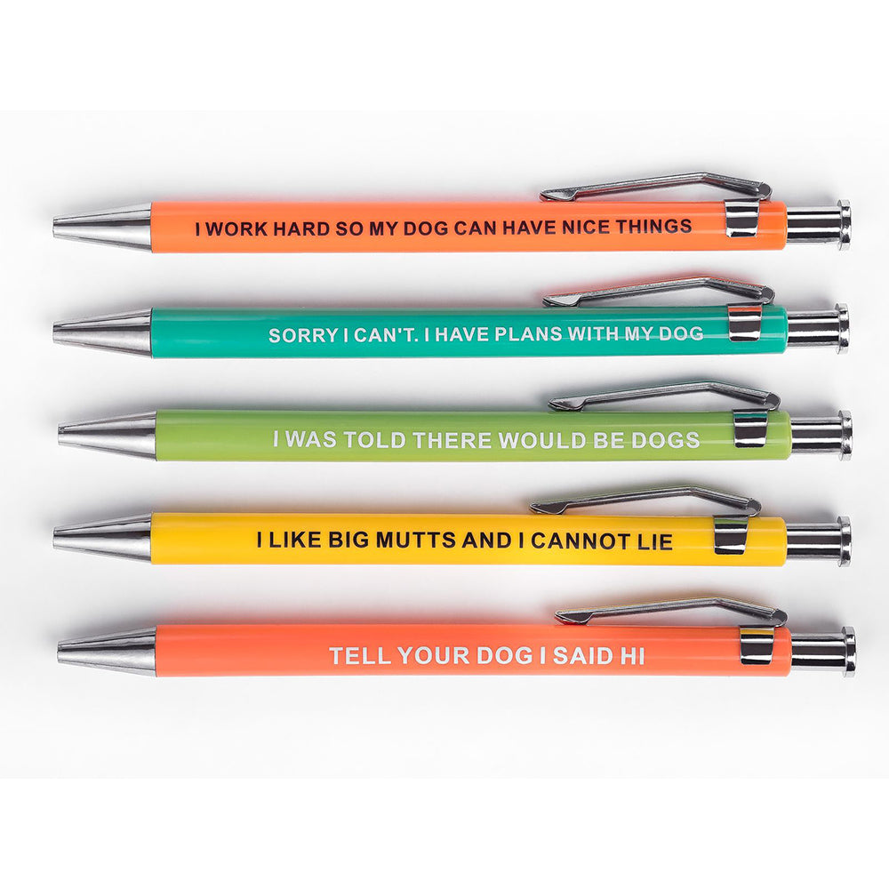 Five colorful pens with funny dog-themed sayings.