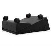Black bondage wedge and ramp combo with cuffs.