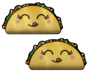 Two kawaii taco nipple pasties with pink cheeks and a tongue sticking out.