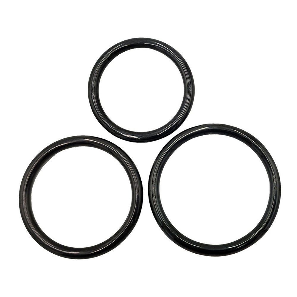 Three black stainless steel cock rings arranged in a triangular formation.