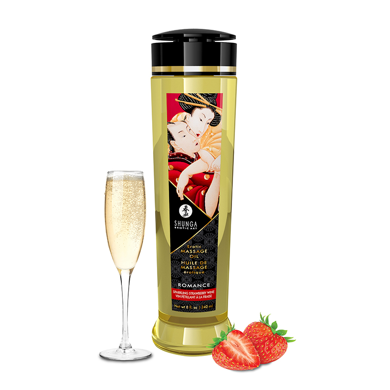 Shunga Champagne & Strawberries massage oil bottle with a champagne flute and strawberries.