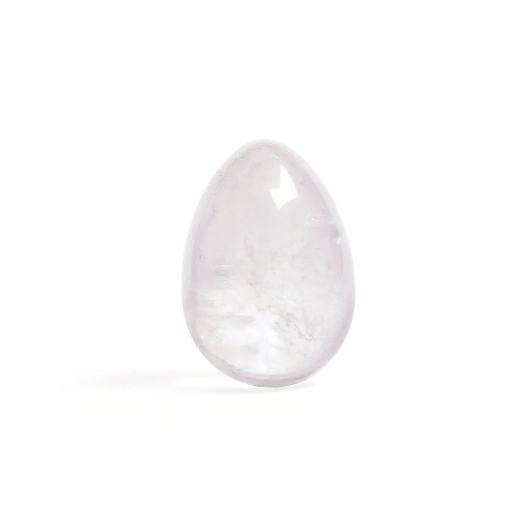 Clear quartz drilled yoni egg for pelvic health.