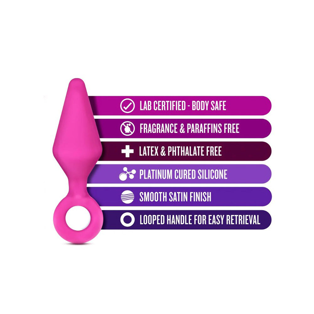 Pink silicone anal plug with a pull ring and safety features.