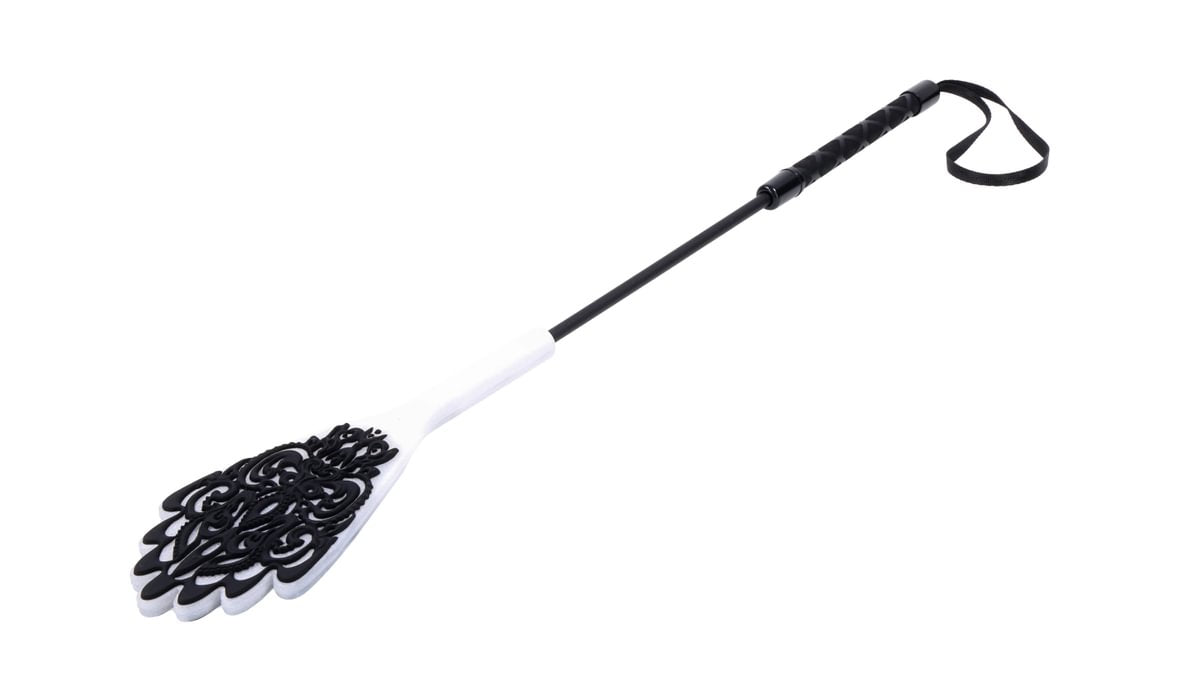 Black and white lace silicone crop whip with a wrist loop.