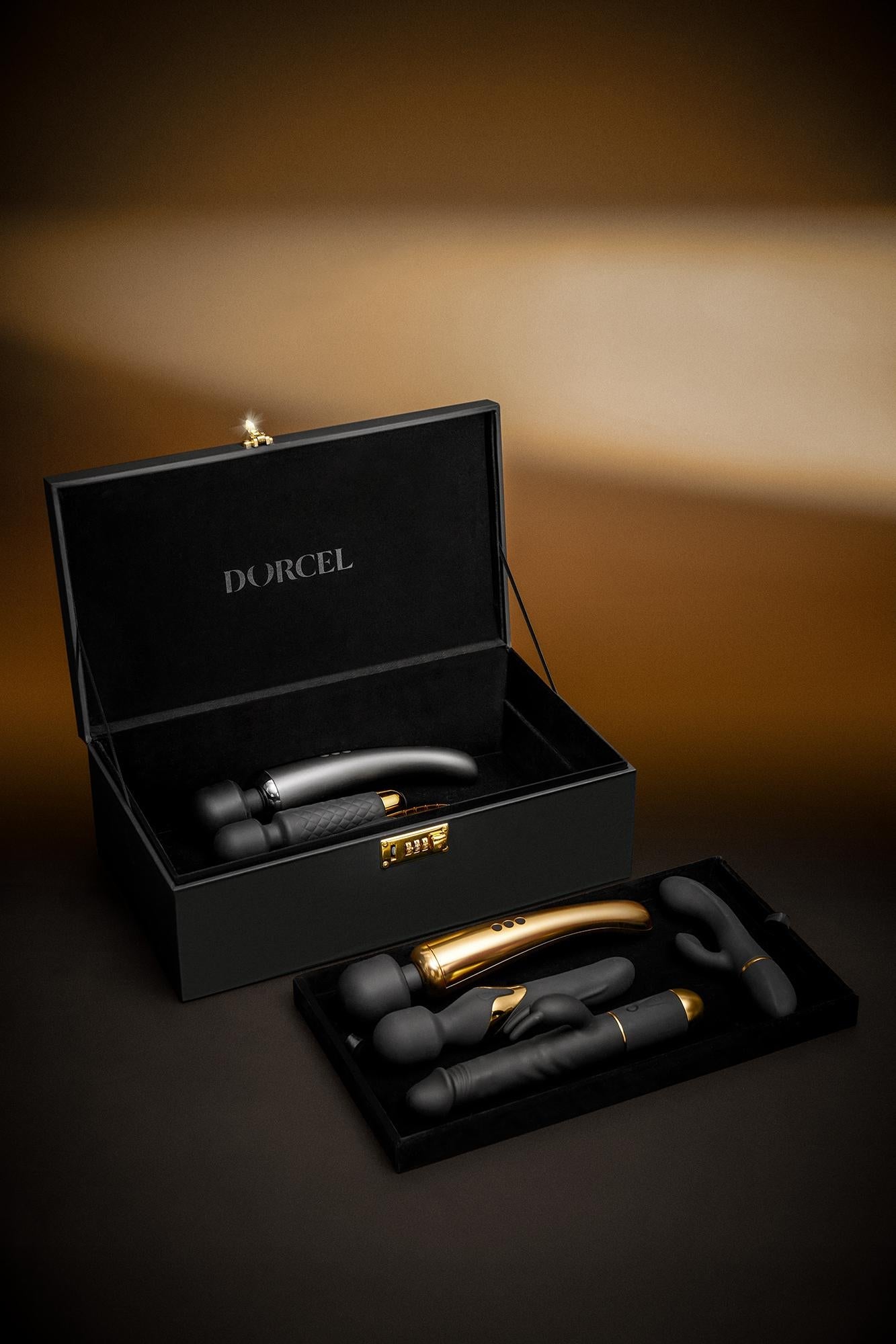 A black faux leather storage case with a combination lock, containing several personal massagers.