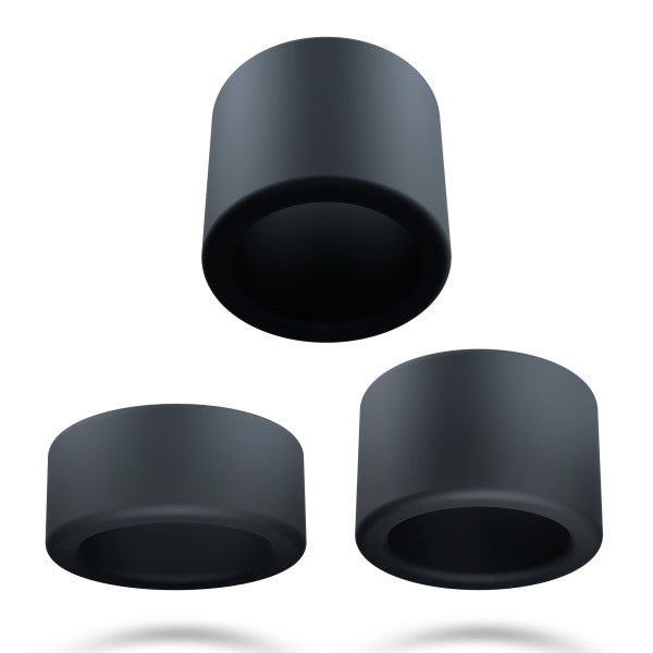 Three black silicone cock rings of varying sizes.