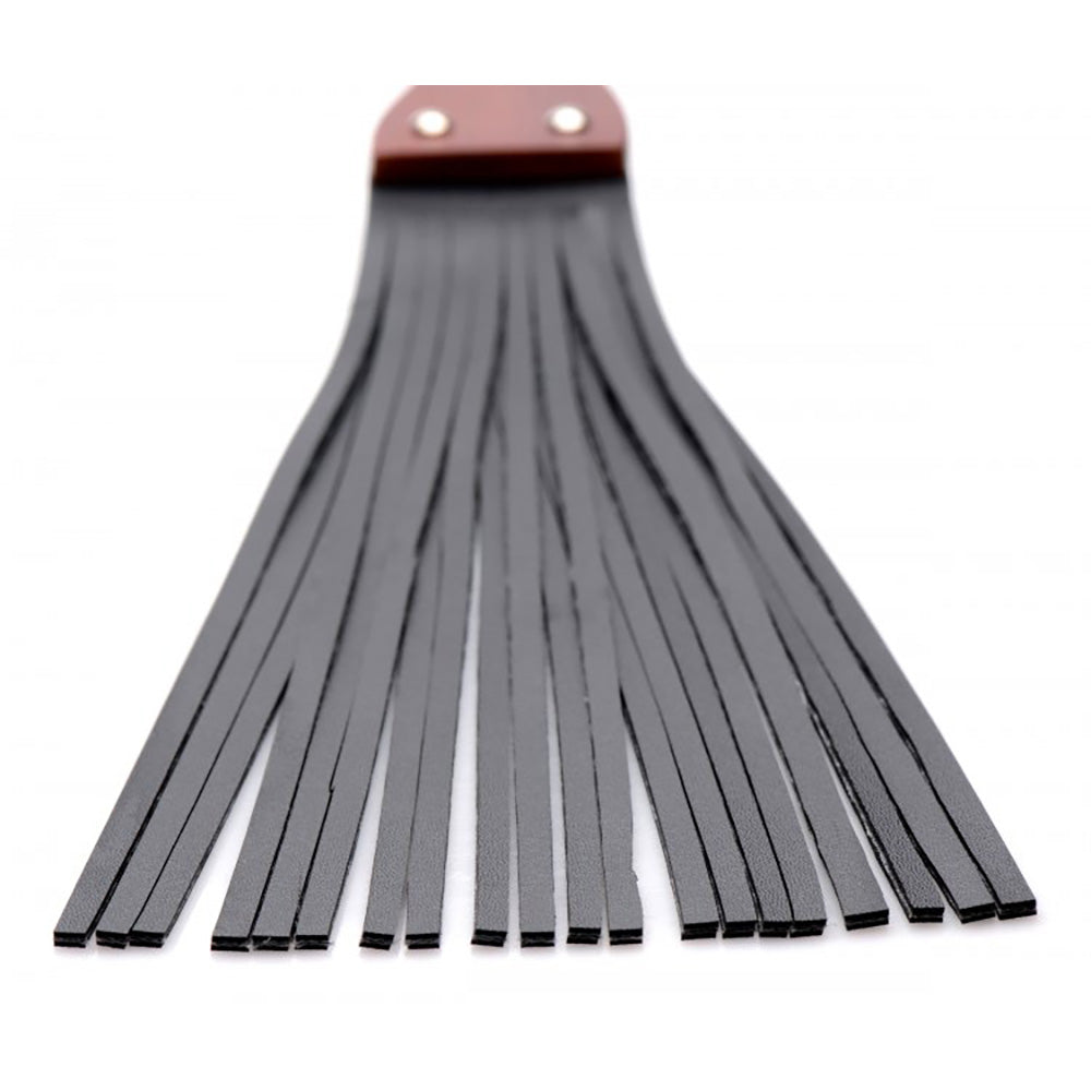 A black PU leather flogger with a brown handle.
