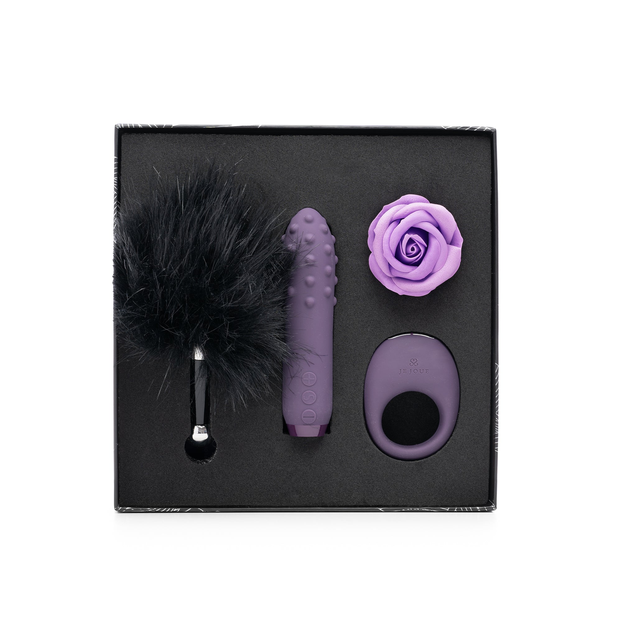 A luxury gift set with a purple vibrator, feather tickler, rose, and cock ring.