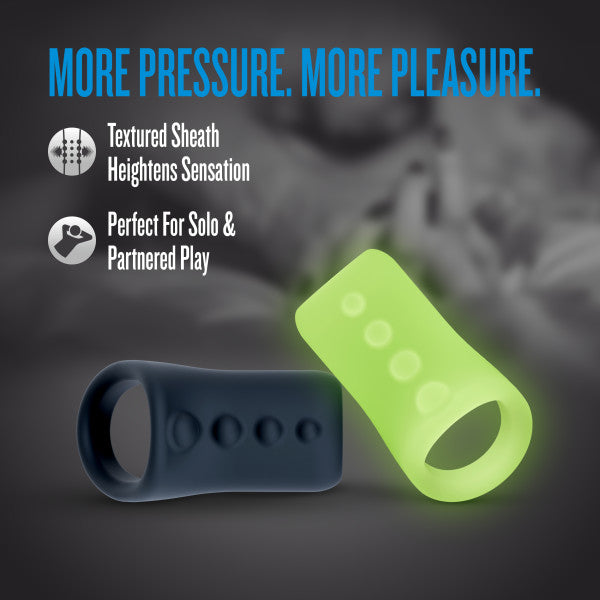 Two textured silicone rings, one dark and one glow-in-the-dark, with raised dots.