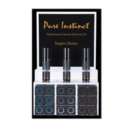 Pure Instinct pheromone perfume oil display with three tester bottles and 22 small bottles.