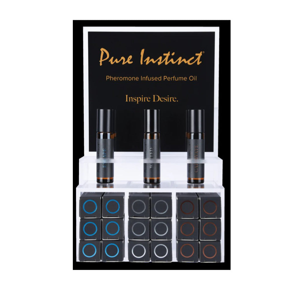 Pure Instinct pheromone perfume oil display with three tester bottles and 22 small bottles.