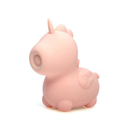 Pink silicone unicorn toy with a horn and closed eyes.