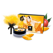 Mango flavored body powder with a yellow feather applicator and a box with erotic art.