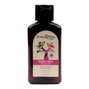 A bottle of Earthly Body Wild Pink Rose Bubble Bath with a tree design.