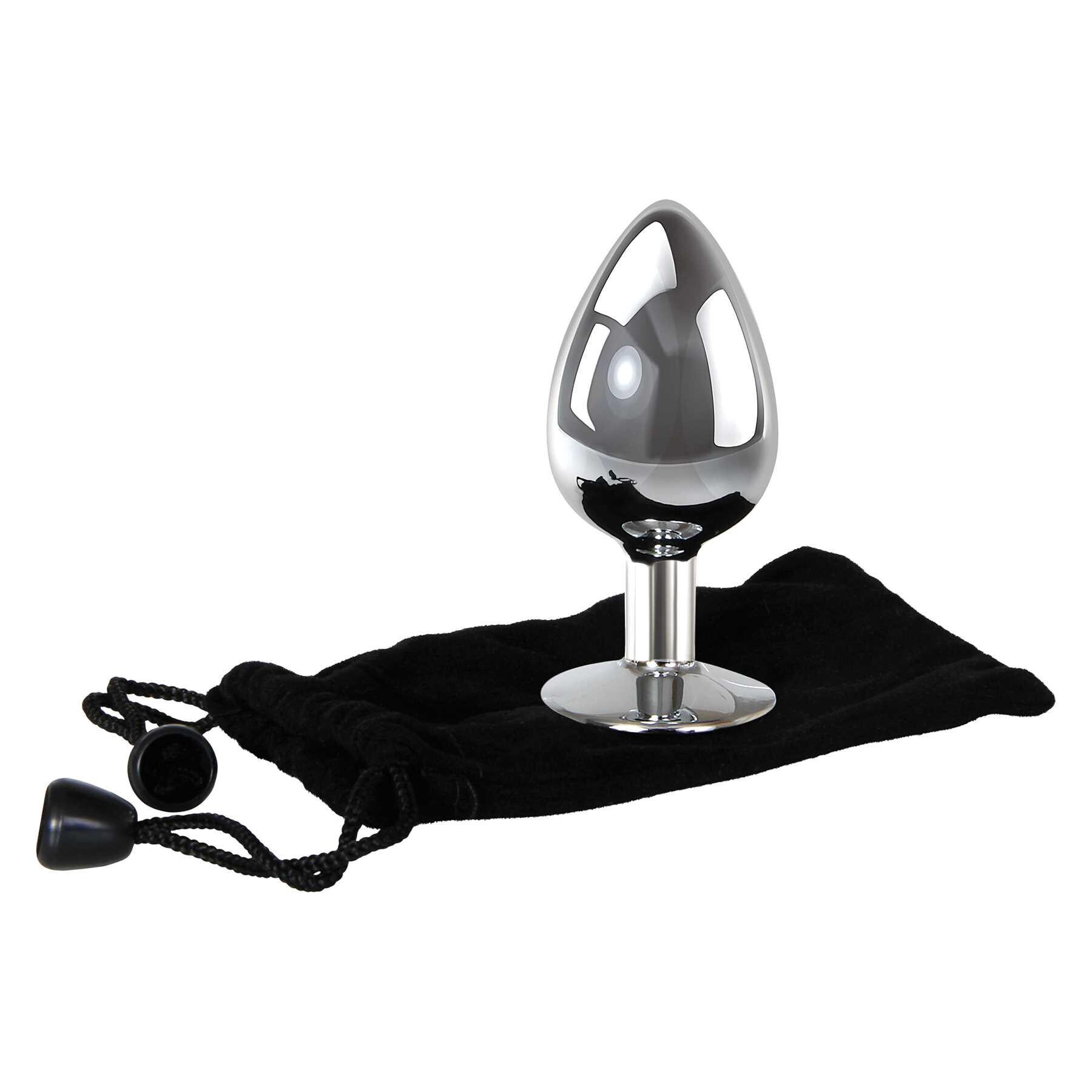 Large aluminum anal plug with a clear gem and black storage bag.