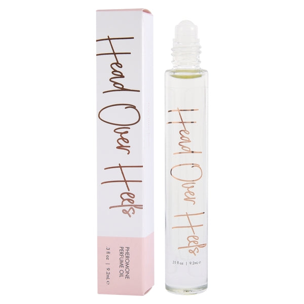 Head Over Heels Pheromone Perfume Oil roll-on bottle and box.