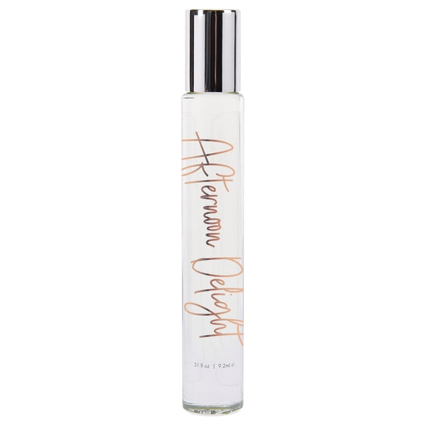 Clear glass roll-on perfume bottle with "Afternoon Delight" in rose gold script.