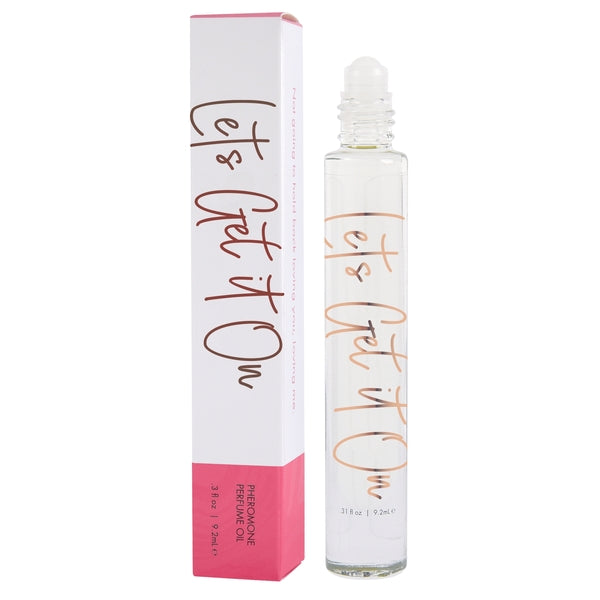 A roll-on pheromone perfume oil with "Let's Get It On" text on the bottle and box.
