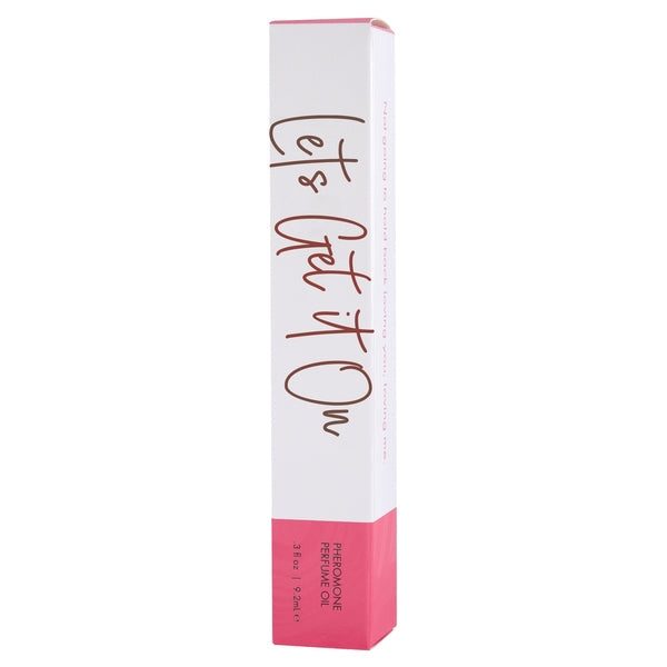 A white and pink box with "Let's Get It On" perfume oil.