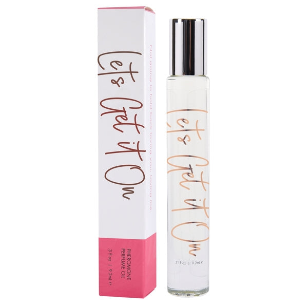 A roll-on bottle and box for "Let's Get It On" pheromone perfume oil.
