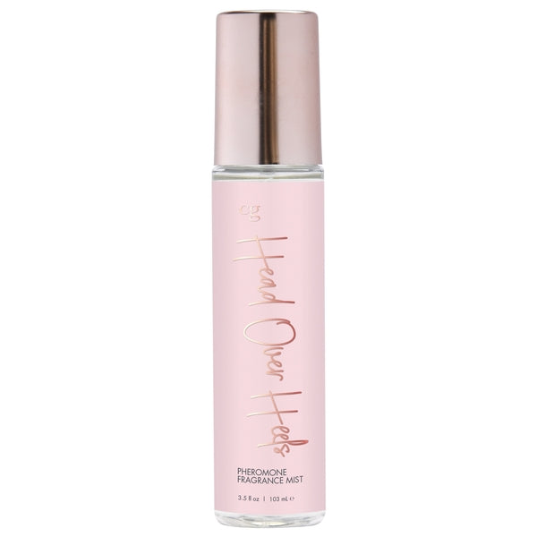 A pink bottle of Head Over Heels Pheromone Fragrance Mist.