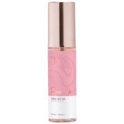 Berry Burst flavored oral sex gel in a pink bottle with a rose gold cap.