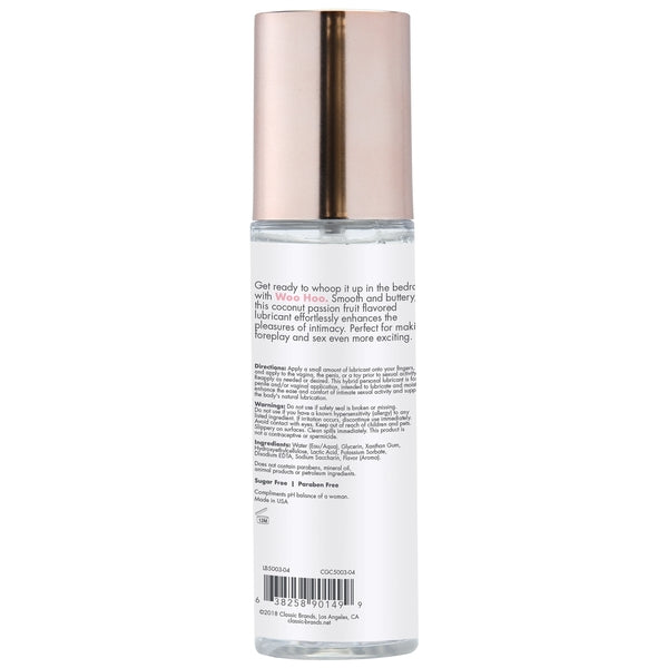 Woo Hoo Coconut Passion water-based personal lubricant in a clear bottle with a rose gold cap.