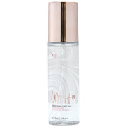 Woo Hoo Coconut Passion water-based personal lubricant in a clear bottle with a rose gold cap.
