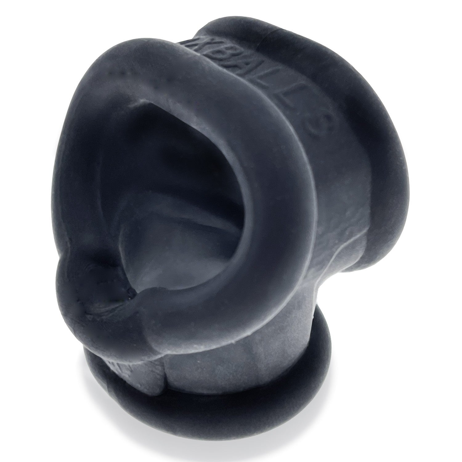 A black silicone cock ring and ball stretcher with "OXBALLS" embossed on it.