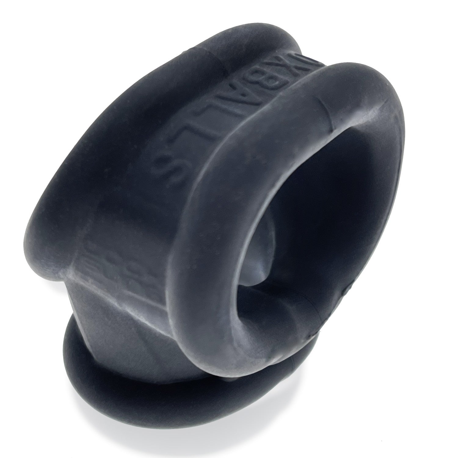 A black silicone cock ring and ball stretcher with the Oxballs logo.