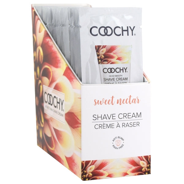 Coochy Sweet Nectar shave cream foil packets in a display box.