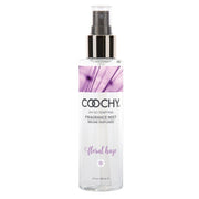 Coochy Floral Haze Fragrance Mist in a clear spray bottle with a purple floral design.