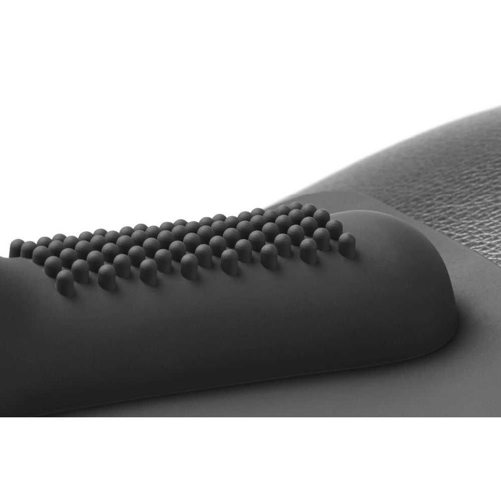 Black riding sex machine with textured surface.