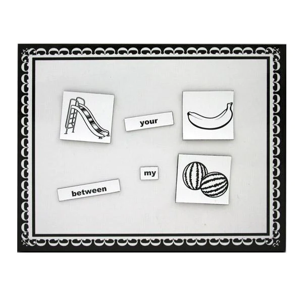 Magnetic word game with images of a slide, banana, and watermelons.