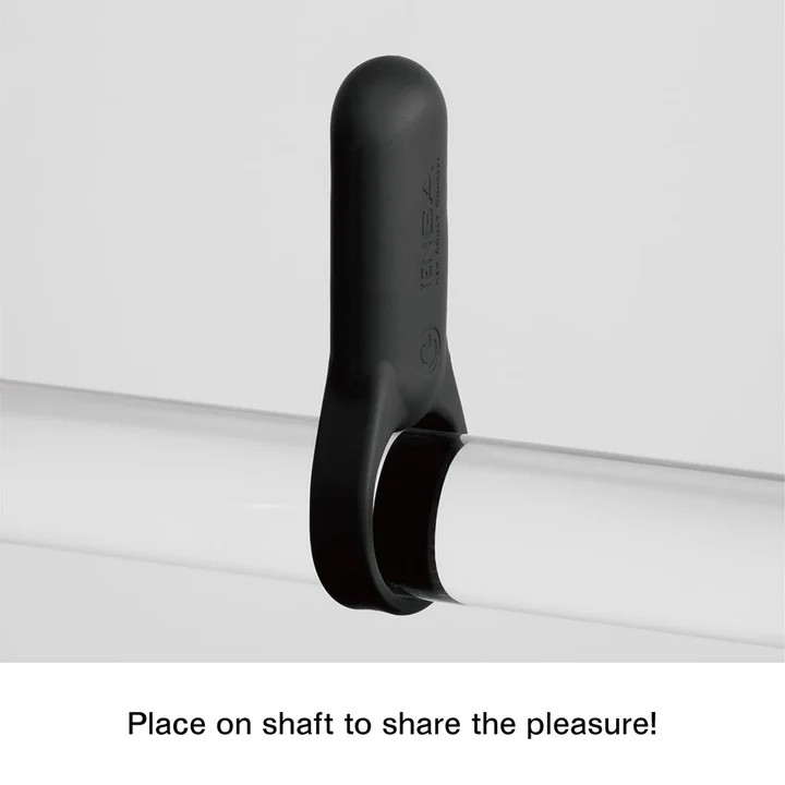 Black Tenga SVR+ vibrating cock ring on a clear tube.