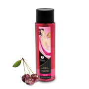 A bottle of Shunga Frosted Cherry Bath & Shower Gel with three cherries.