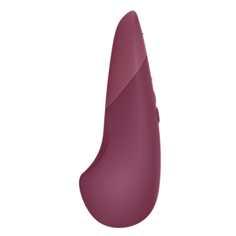 A dusky pink clitoral vibrator with a curved ergonomic shape.