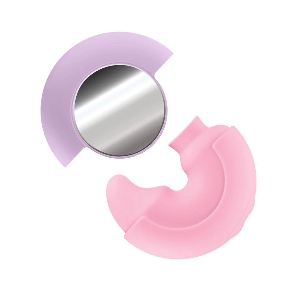 A purple and pink dual-ended vibrator with a mirror.