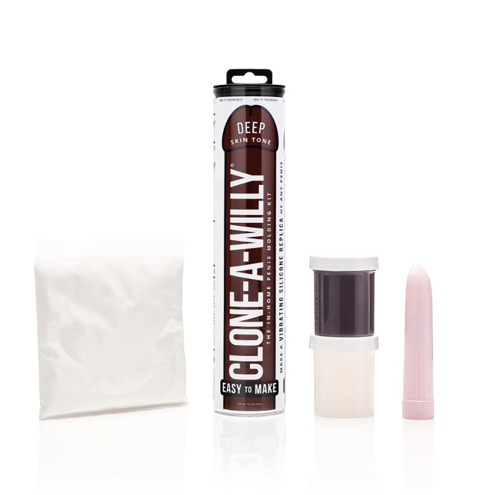 Clone-A-Willy kit with molding powder, tube, vibrator, and silicone.