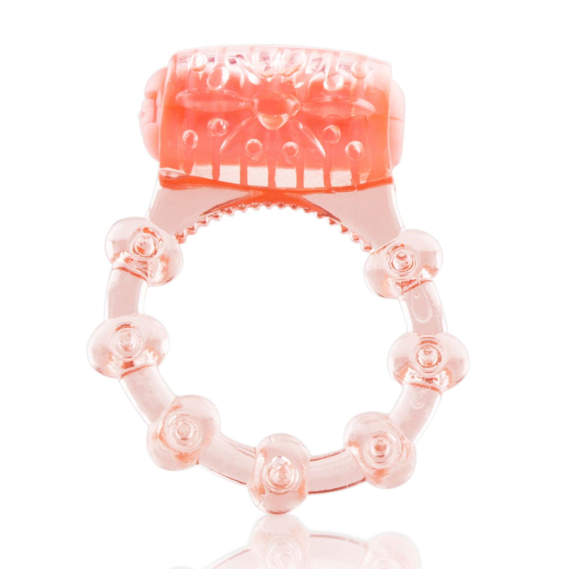 A pink vibrating pleasure ring with textured bumps.