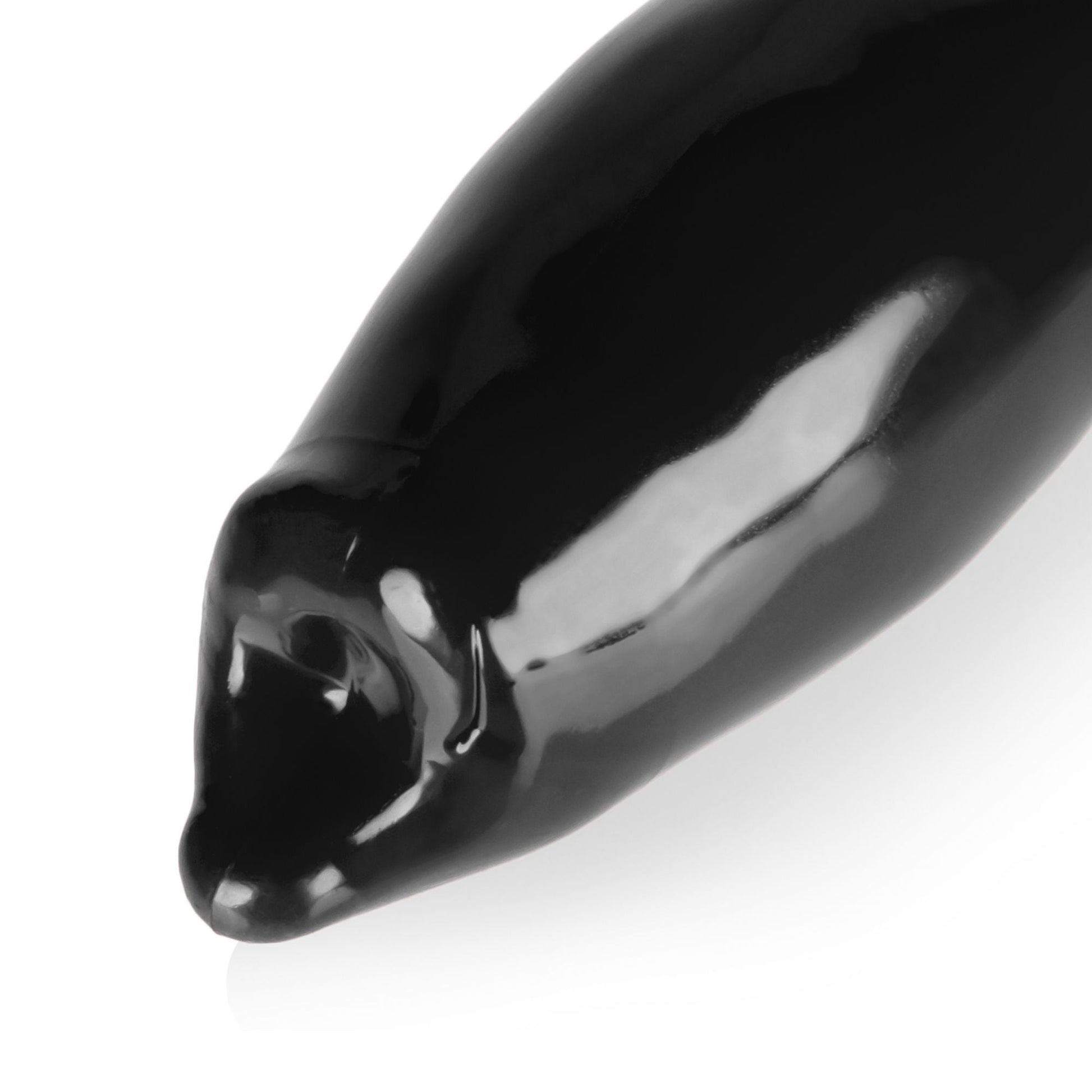 Black stretchy cock sheath with bullet insert.