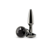 Small gunmetal black tapered aluminum anal plug with a black gem accent.