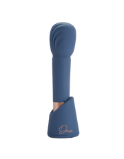 Blue rechargeable silicone massage wand with a textured head and charging stand.