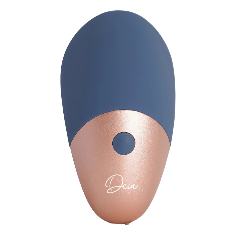 A blue and rose gold rechargeable wand massager with a button and the Deia logo.