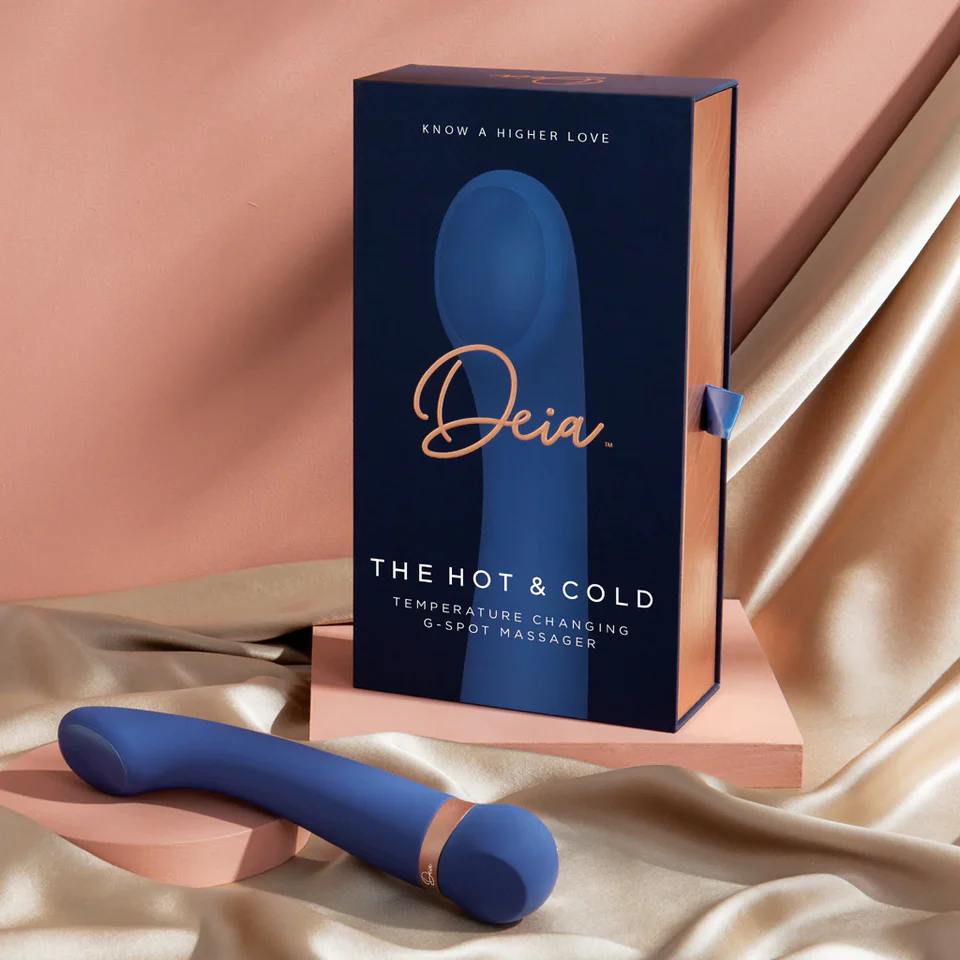 A blue Deia hot and cold G-spot massager with its box.
