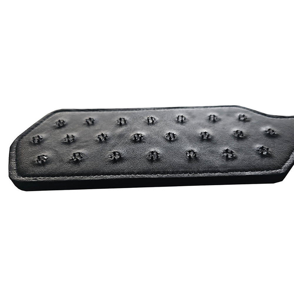 Black leather paddle with 22 clusters of metal spikes.