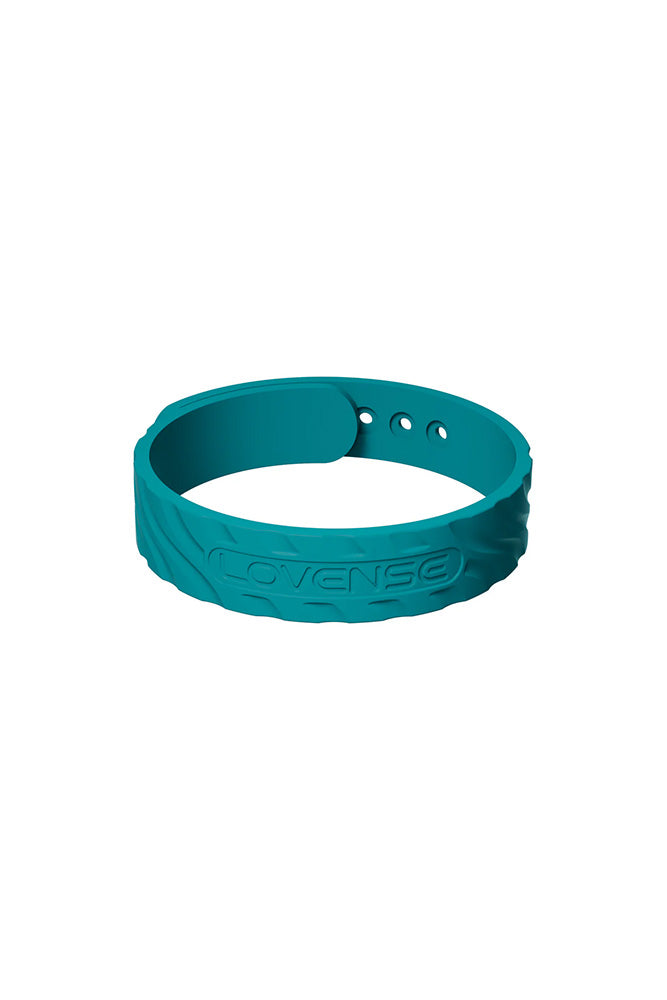Teal Lovense wristband with textured pattern and three small holes.